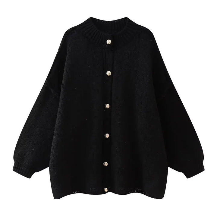 Schwarze, bequeme Damen Oversized Strickjacke mit langer Knopfleiste & weiten Ärmeln für einen modernen Lagenlook.