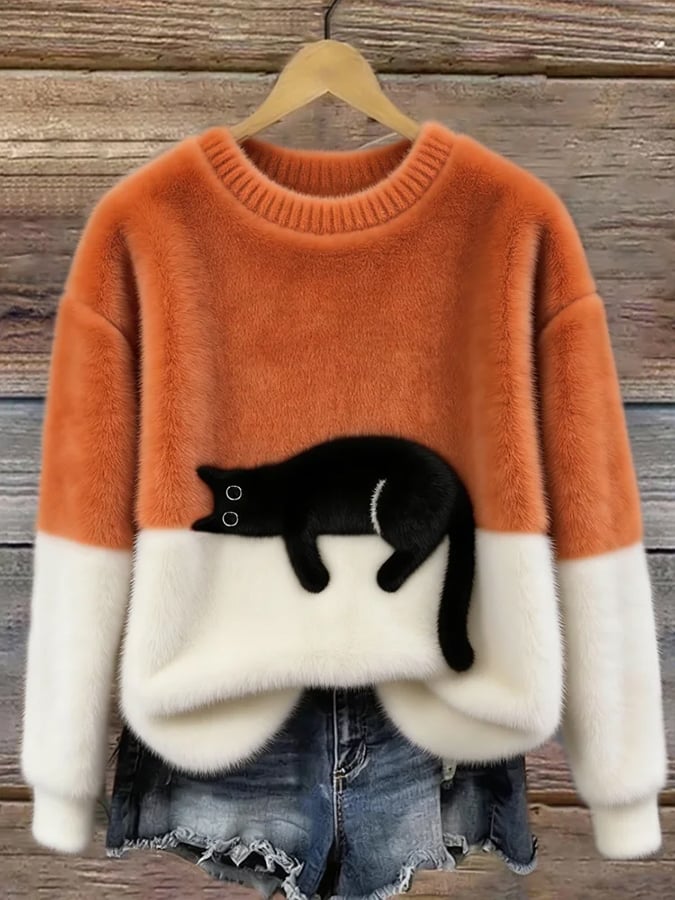 Weicher, oversized Damen Pullover mit einzigartigem Katzenmotiv, ideal für bequemen Casual-Look.
