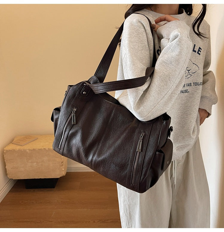 Robuste schwarze Damen Alltagstasche. Vielseitige Schulter- und Reisetasche.