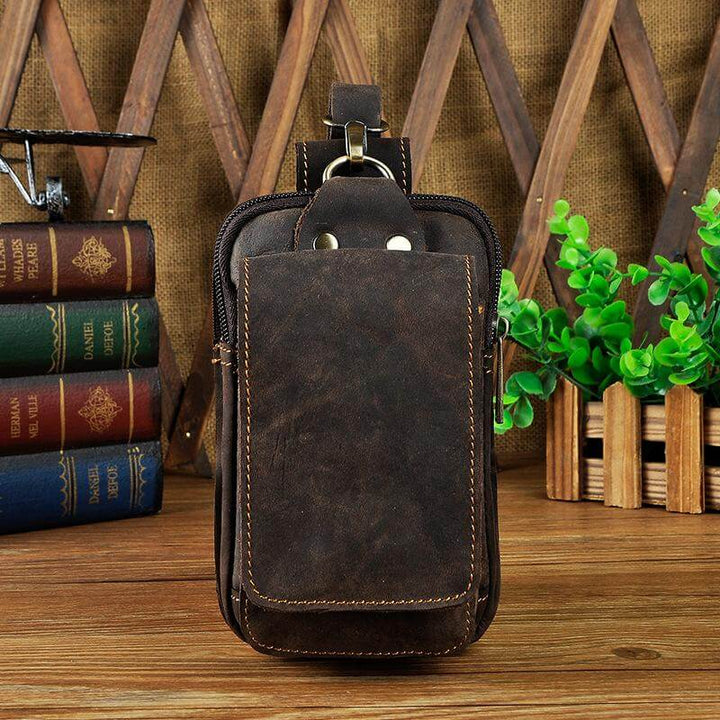 Praktische Leder Gürteltasche mit mehreren Fächern für optimale Organisation von Wertsachen.