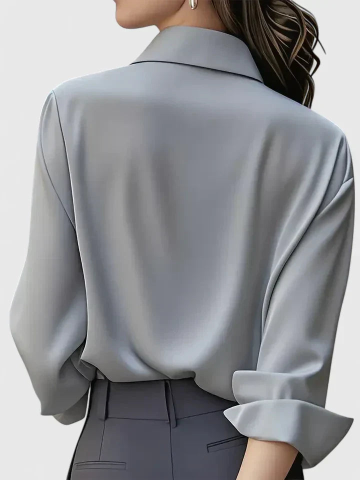 Elegantes, figurbetontes Damen Langarmtop in Marineblau, ideal für stilvolle Auftritte. Hochwertiges Basic.