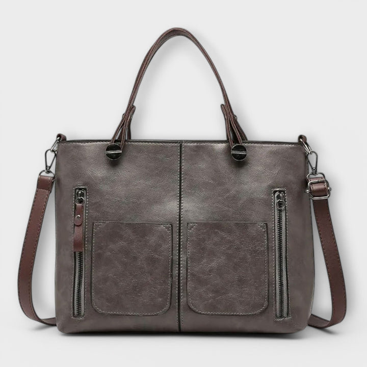 Zeitlose schwarze Damen Lederhandtasche, funktional und chique. Ideal für Büro & Freizeit.