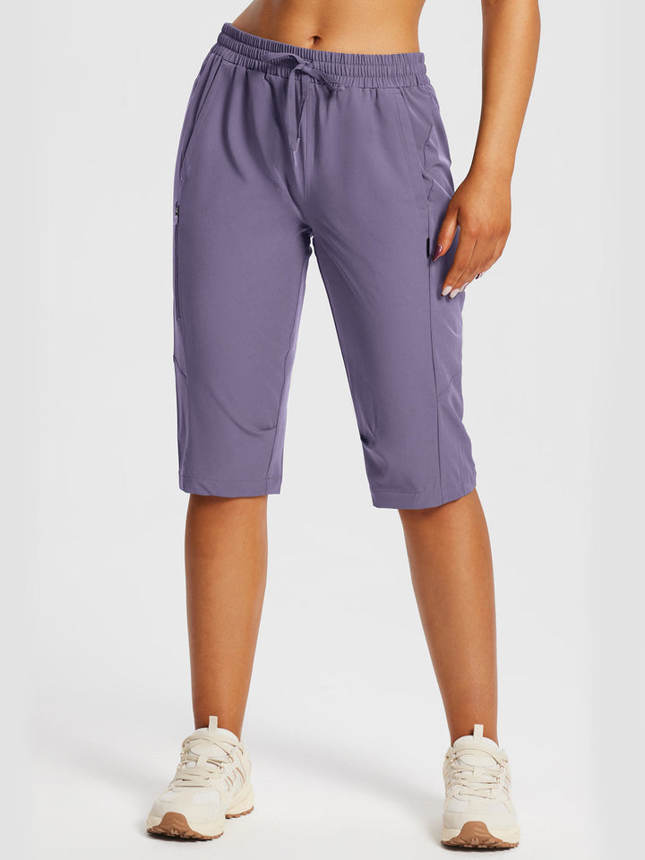 Robuste Damen Wander-Capris mit Reißverschlusstaschen für lange Touren.