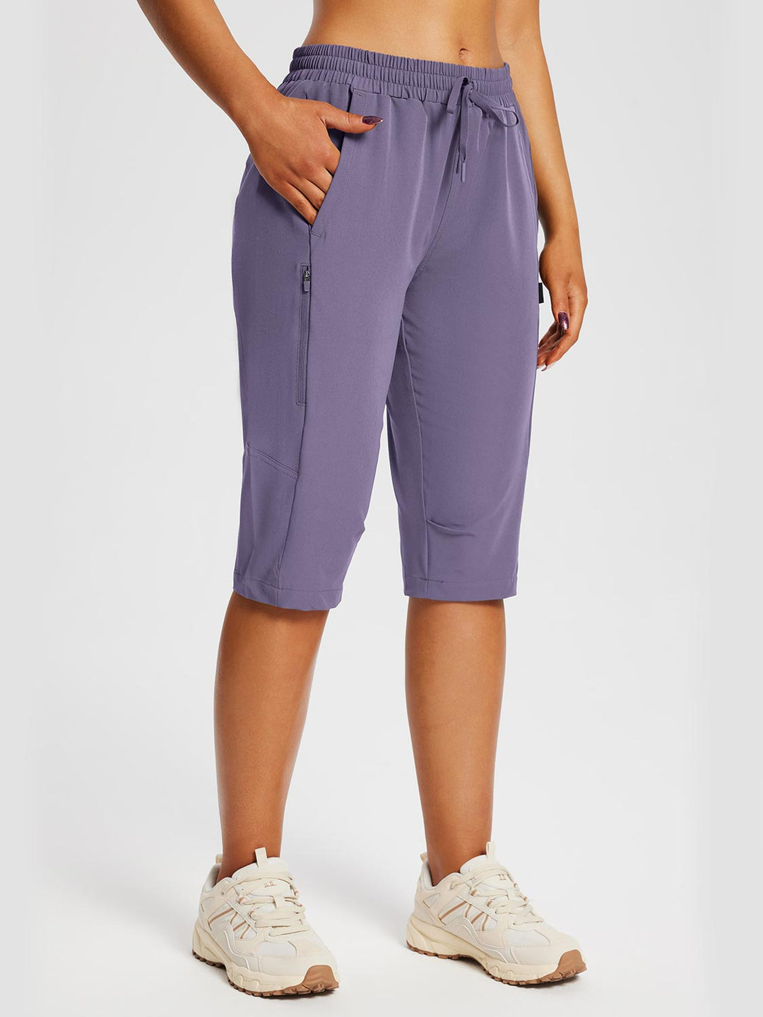 Damen Wander-Capris in sportlichem Schnitt, mit nützlichen Reißverschlusstaschen.