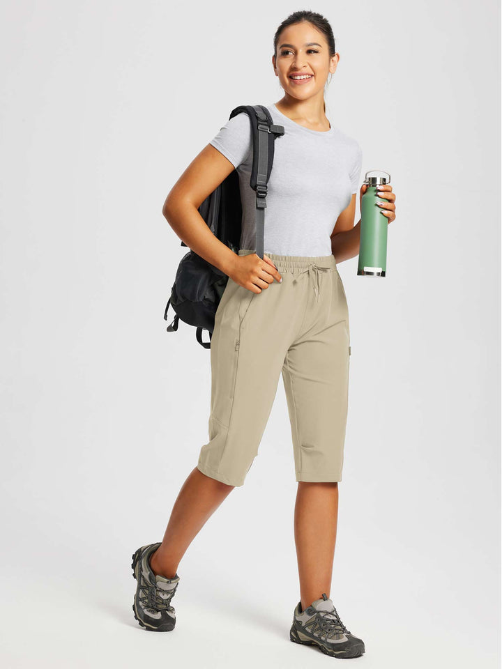 Damen Sport-Capris, leichter Stoff, mit UV-Schutz 50+ & Reißverschlusstaschen.