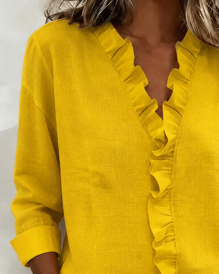 Stilvolle Damenbluse mit Dreiviertelarm für Freizeitmode. Bequemes Oberteil mit elegantem V-Ausschnitt.