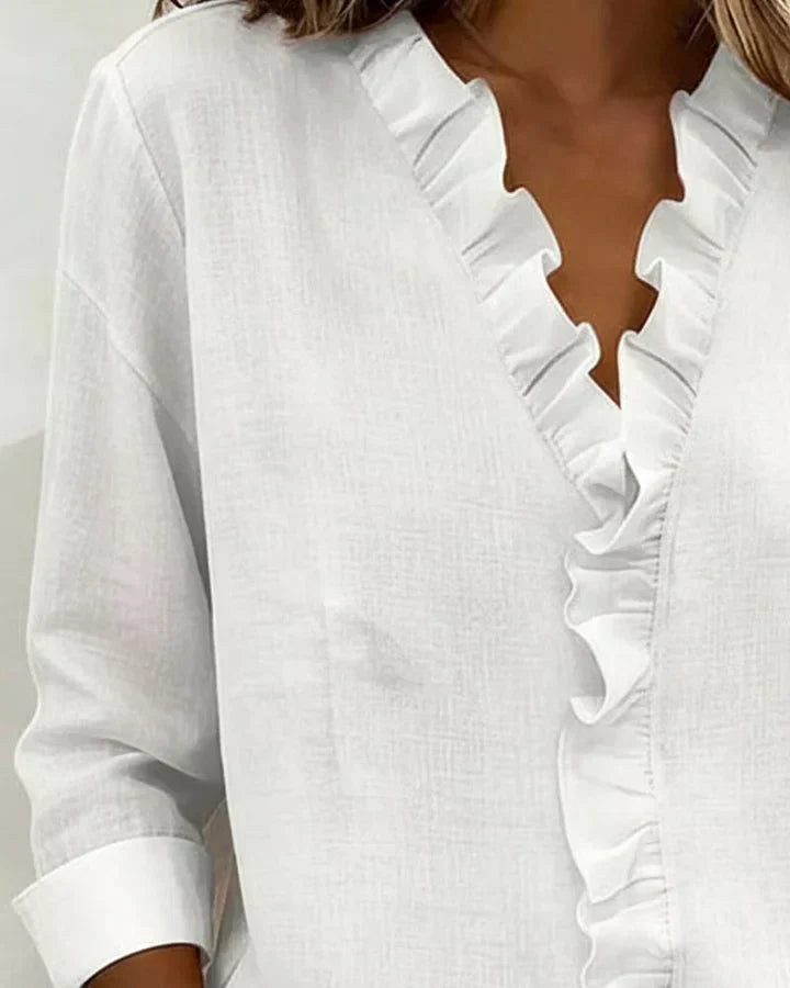 Elegante Damen-Dreiviertelarm-Bluse für Büro & Freizeit. Bequemes Oberteil mit modischem V-Ausschnitt.
