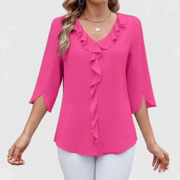 Elegante Freizeit-Bluse für Damen mit V-Ausschnitt & verspielten Rüschen. Ideal für entspannte & schicke Looks.