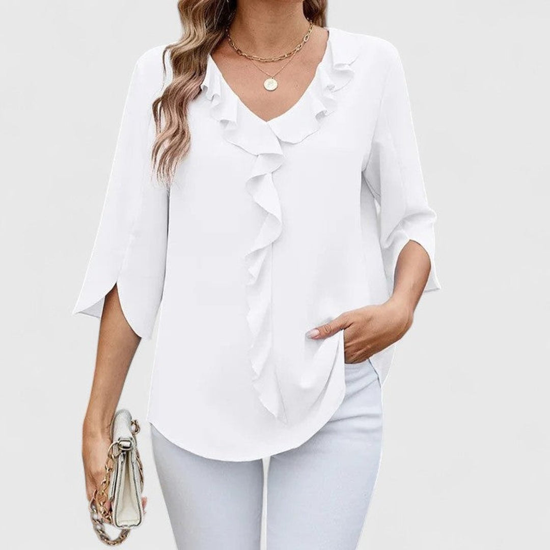 Elegante Damenbluse mit Rüschen am V-Ausschnitt. Vielseitiges Oberteil für Freizeit, Büro und besondere Events.
