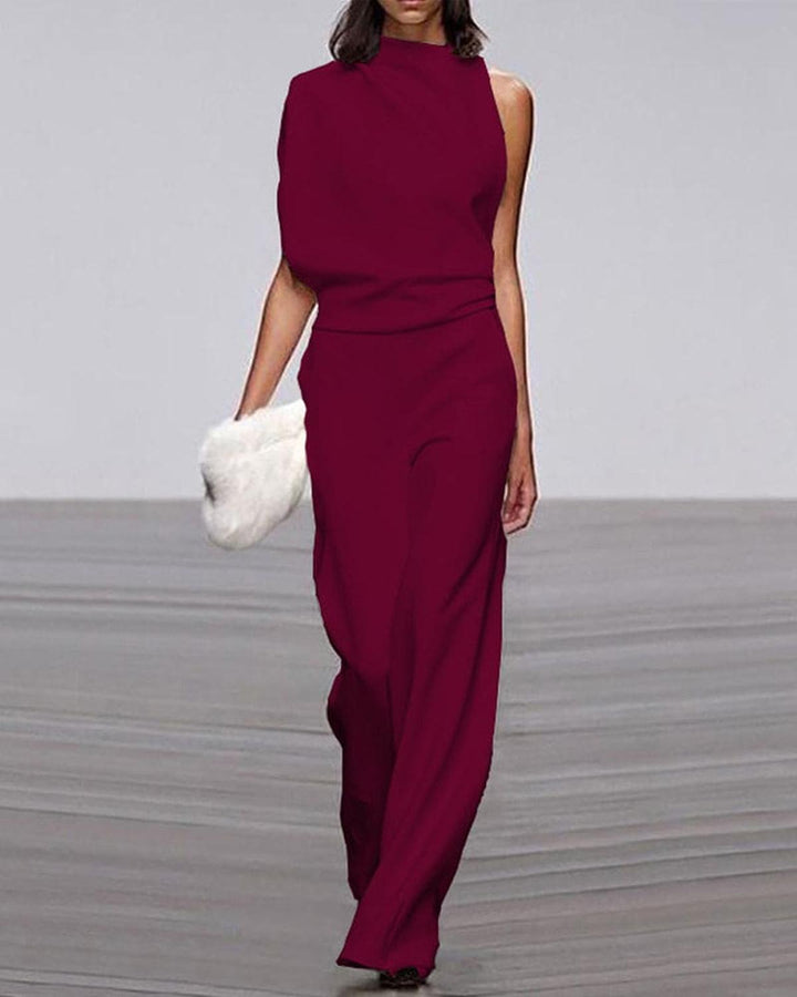 Schwarzer eleganter Damen-Jumpsuit, weites Bein, One-Shoulder. Perfektes Party-Outfit für festliche Abende.