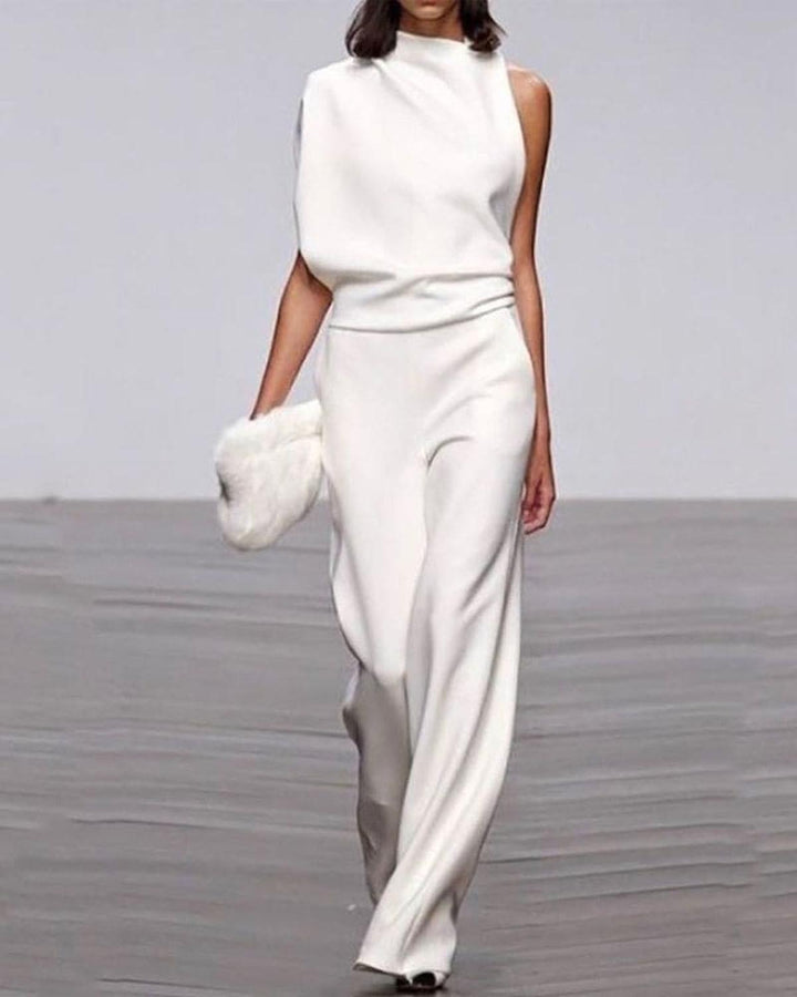 Eleganter Damen-Jumpsuit mit weitem Bein für festliche Anlässe. Ideal als Hochzeitsgast Outfit oder für Abendmode.