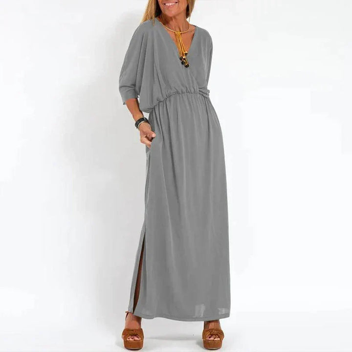 Schwarzes festliches Damen Maxikleid Sophia. Elegantes langes Abendkleid mit V-Ausschnitt für Herbsttage.