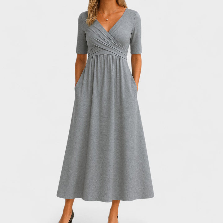 Elegantes Damen Midikleid mit Wickeleffekt in A-Linie, figurschmeichelnd & stilvoll für Alltag oder Abend.