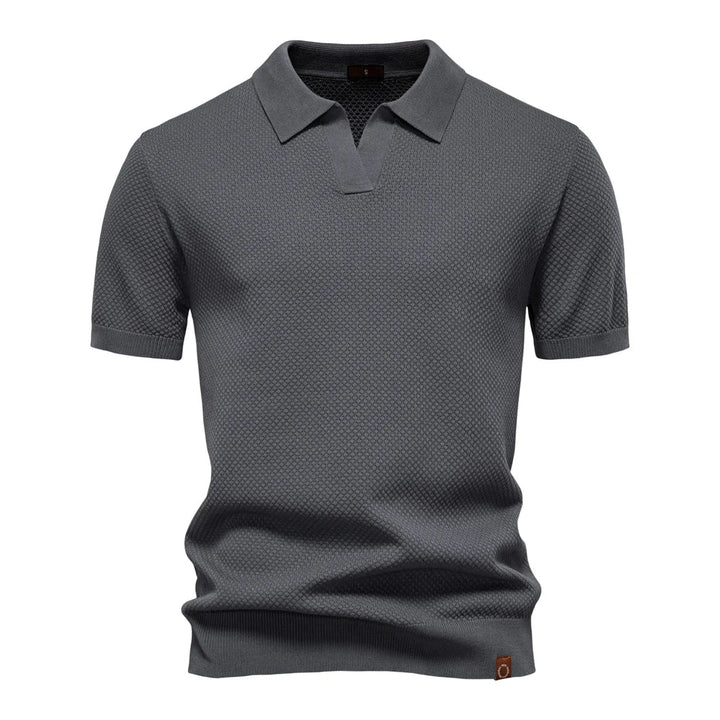 Schlichtes, elegantes Herren Poloshirt Elio. Strukturiertes Design und Kurzarm für stilvolle Freizeitlooks.