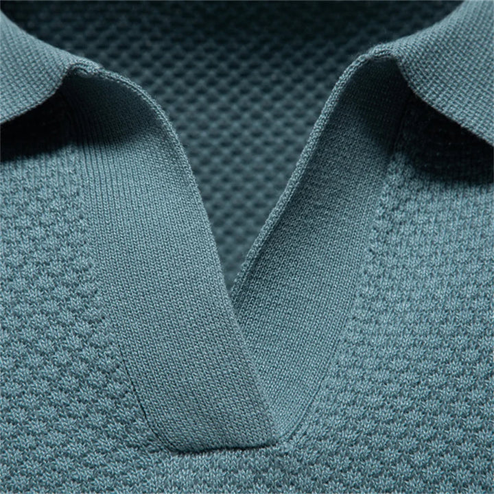 Herren Poloshirt Elio für Business Casual Looks. Komfortables, strukturiertes Kurzarm-Oberteil mit stilvoller Eleganz.