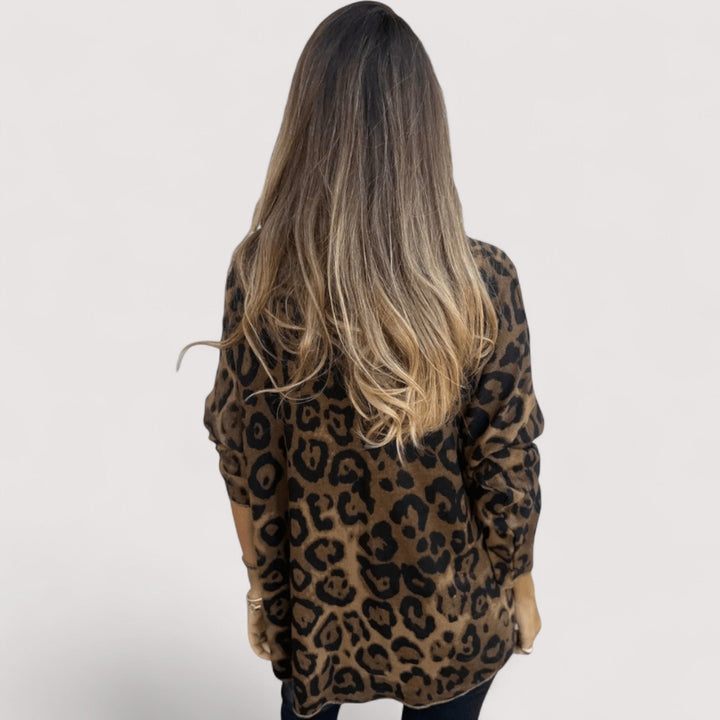 Bequemes Damen Leopardenmuster Oberteil mit lockerer Passform. Vielseitiges Freizeit Shirt für moderne Damen Mode.