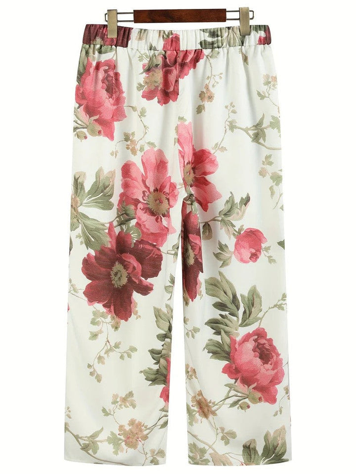 Modische Damen Freizeithose mit farbenfrohem Blumenmuster und bequemem weitem Bein für Komfort den ganzen Tag.