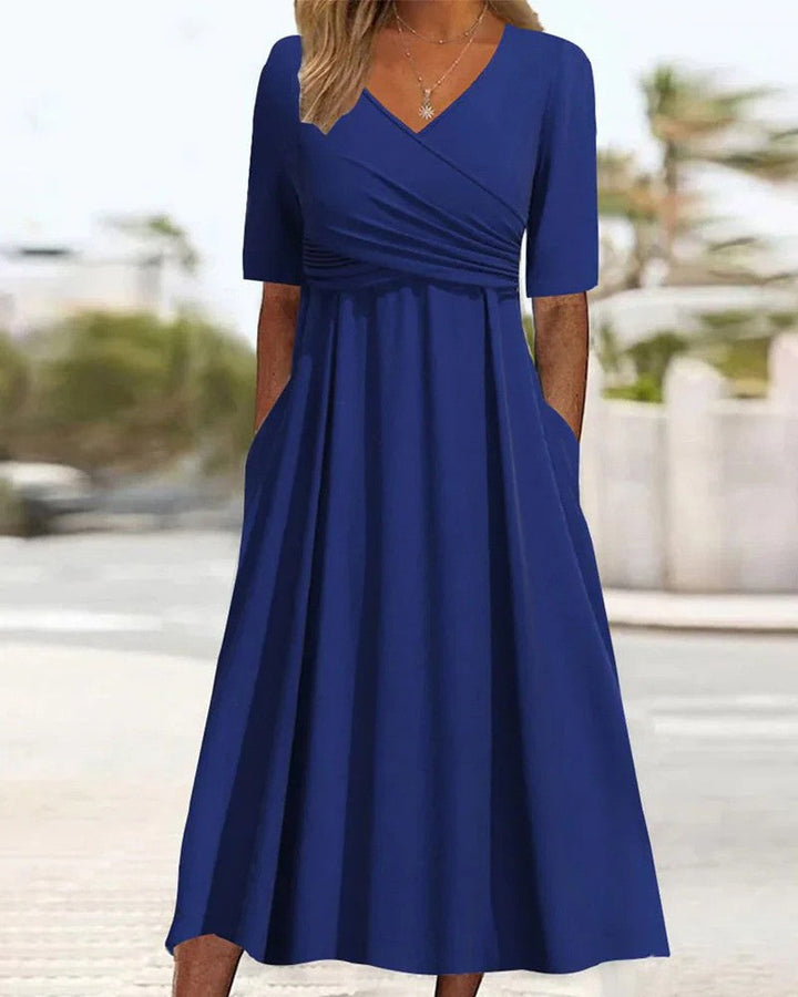 Elegantes, figurbetontes Damen Midikleid mit Langarm, perfekt für stilvolle Herbsttage im Büro oder in der Freizeit.