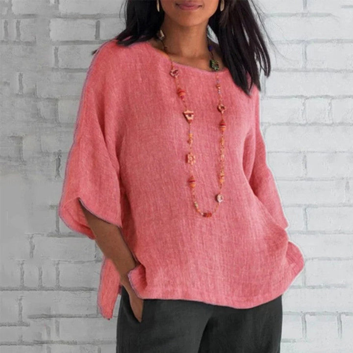 Elegante, lässige Damen Kurzarmbluse für Sommer. Leichte, atmungsaktive Hemdbluse in Tunika-Form für Freizeit.