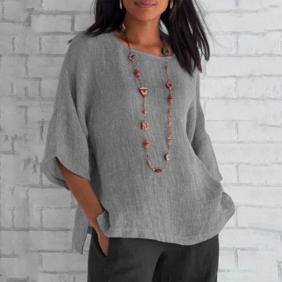 Trendige Damen Oversize-Bluse mit Kurzarm. Leicht & atmungsaktiv, ideal als Freizeit- oder elegante Sommer-Tunika.