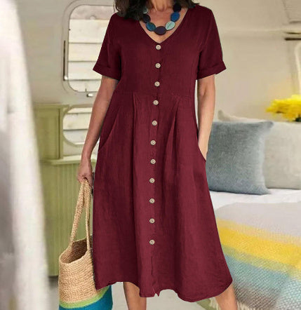 Elegantes Damenkleid, locker geschnitten, mit V-Ausschnitt und Knopfleiste. Ideal als Sommerkleid für Freizeit.