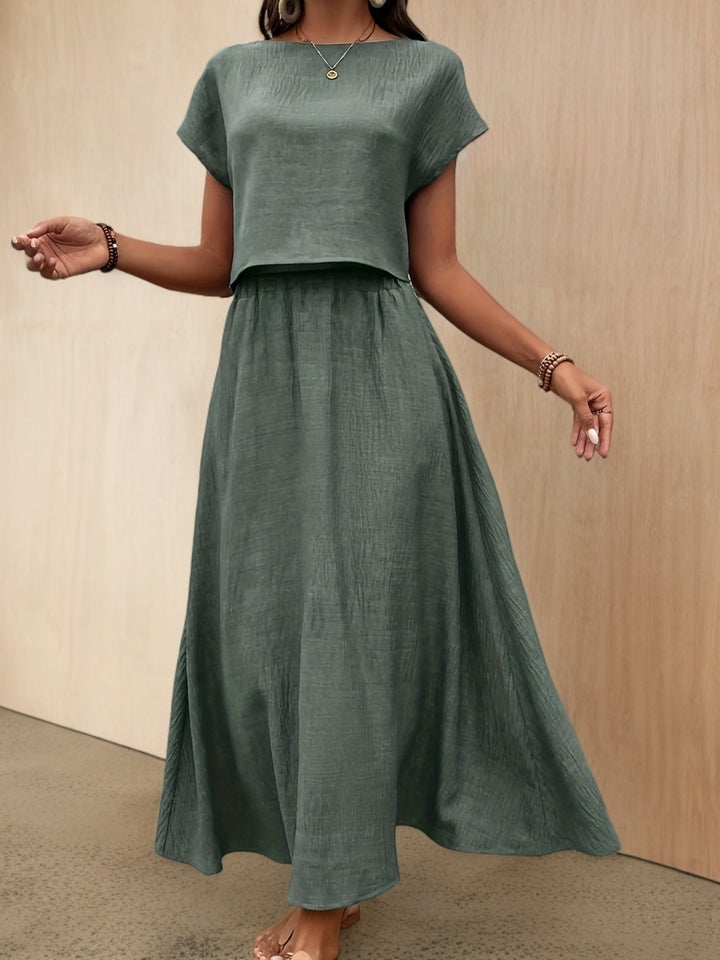 Damen elegantes Zweiteiler Set: Crop Top & Maxirock für stilvolle Sommer-Outfits. Perfekt für Urlaub & Party.