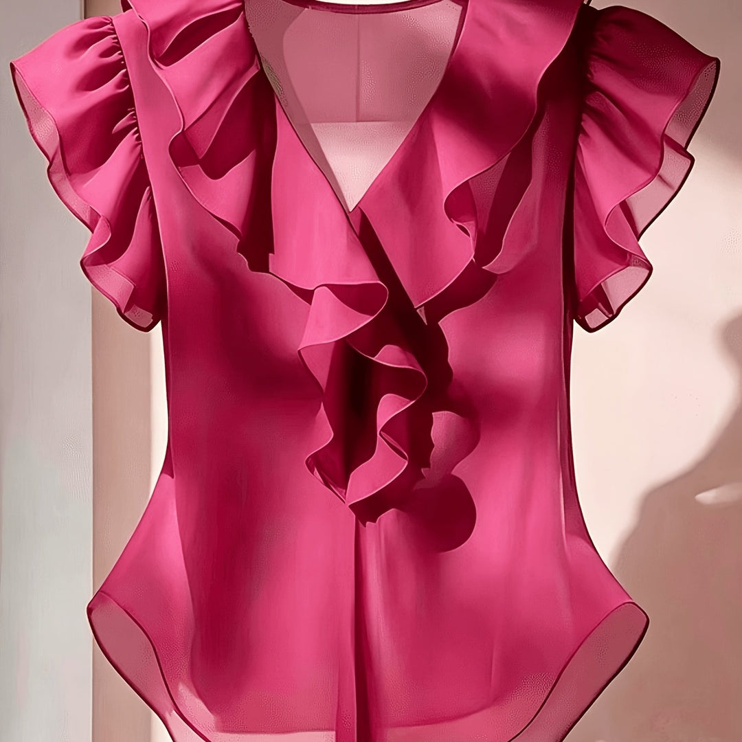 Vielseitige Bluse mit V-Ausschnitt & Rüschen. Passt zu Rock oder Hose.