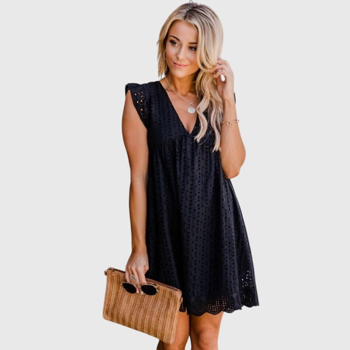 Lässiges Damen Mini-Kleid für den Sommer, entspannter Schnitt, V-Ausschnitt und ärmellos.