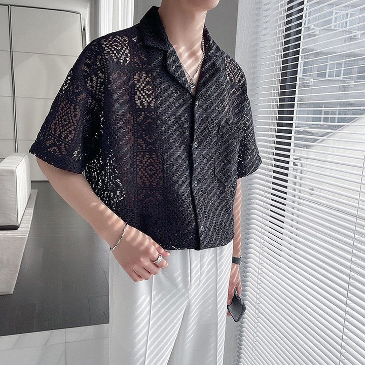 Schwarzes Langarm-Herrenhemd im Loosefit-Stil mit Kuba-Kragen für lässige Eleganz.