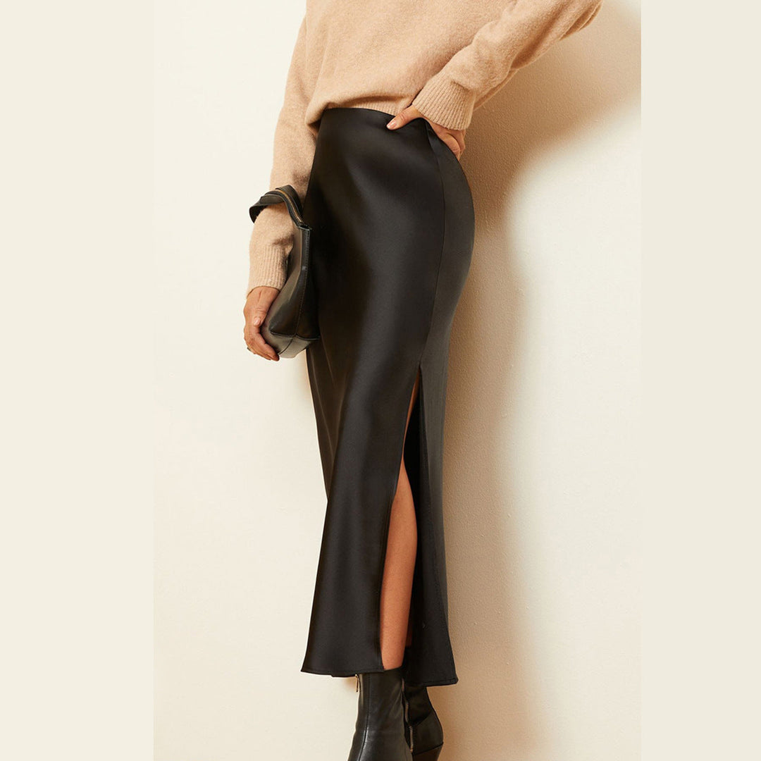 Klassischer Damen Midirock, hoher Bund, eleganter Gehschlitz. Zeitloses Design für vielseitige und stilvolle Kombinationen.