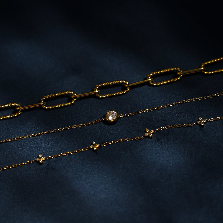 Strapazierfähiges Damen Armband Kleeblatt gold/silber, wasserfest & hypoallergen. Edelstahlschmuck mit Zirkonbesatz.