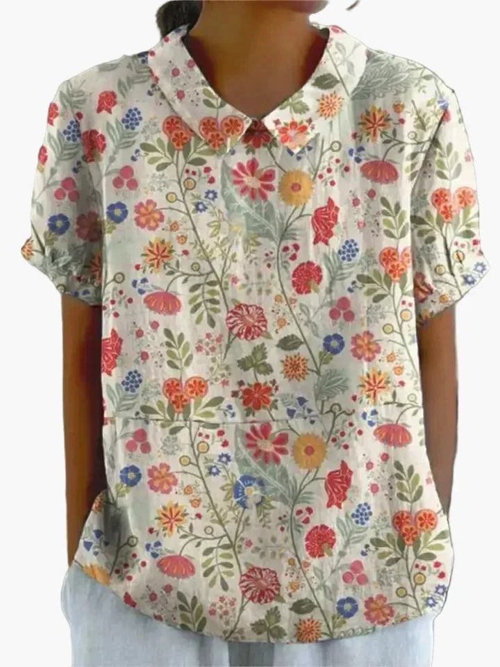 Elegante Damen Büro-Bluse mit Blumenmuster, Kragen & Kurzarm; professionell & stilvoll zugleich.