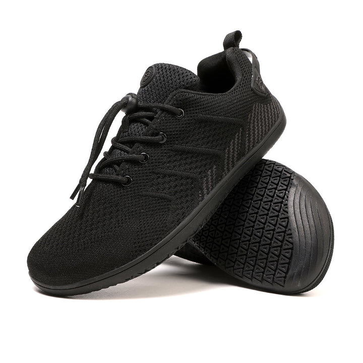 Flexible Sohle: Rutschfeste Gummisohle des Herren Barfußsneakers, natürliches Laufgefühl & Halt.