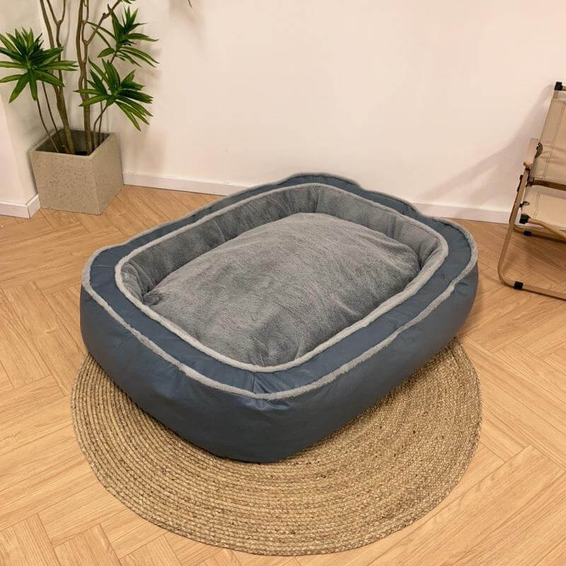 Weiches orthopädisches Tierbett, dunkelblau, mit hohem Rand für Geborgenheit und erholsamen Schlaf des Hundes.