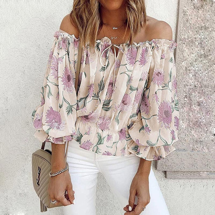 Geblümte Damen Carmen-Bluse Elvira mit Rüschenärmeln, leichter Chiffon, ideal für Frühling & Sommer.