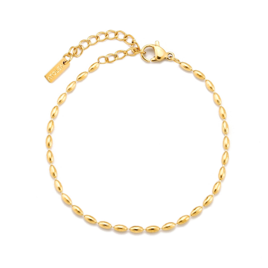 Damen Gold Pebble Armband am Handgelenk. Eleganter, wasserfester Edelstahlschmuck, perfekt für jeden Anlass.