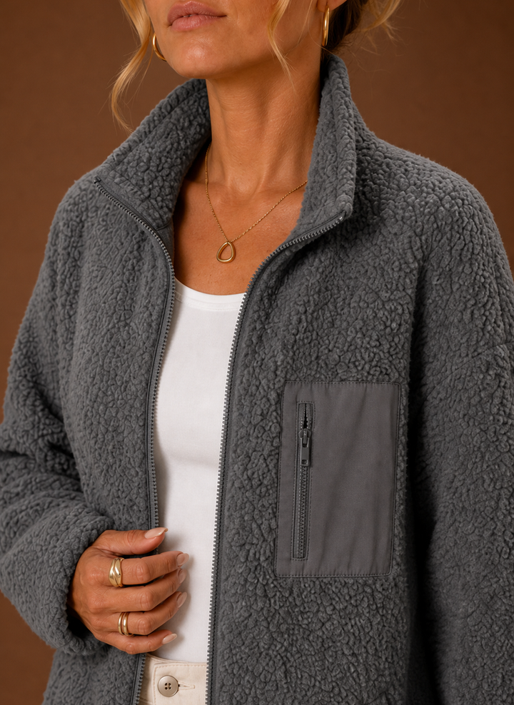 Bequeme Damen Sherpa-Reißverschlussjacke für den Alltag. Locker geschnitten & stilvoll.