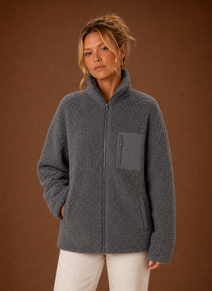 Damen Sherpa-Jacke mit Reißverschluss, kuschelig & locker, ideal für Herbst & Winter. Bequeme Übergangsjacke.