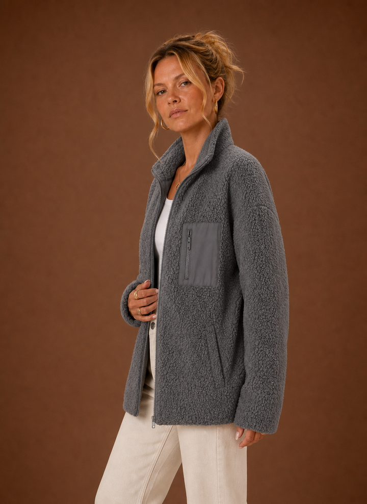 Herbstliche Damen Sherpa-Jacke mit Reißverschluss. Kuschelige Übergangsjacke für kühlere Tage.