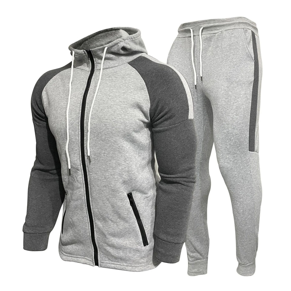 Stylischer Herren Jogginganzug mit Feuchtigkeitskontrolle, perfekt für Sport und gemütliche Freizeitaktivitäten.
