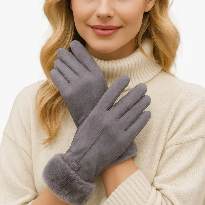 Warme Touchscreen-Handschuhe für Damen. Bequem mit dem Smartphone bedienen und Hände vor Winterkälte schützen.