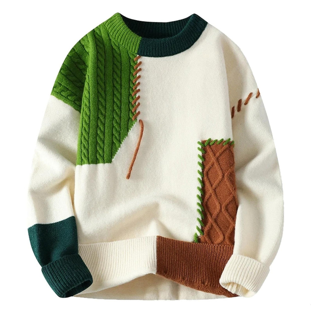 Künstlerischer Männerpullover mit farbenfrohem Patchwork-Muster, moderner Statement-Stil für Herbst.