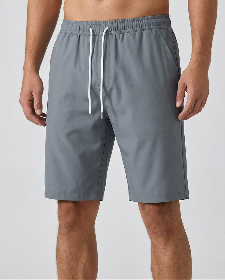 Dunkelgraue Herren Sport Shorts mit elastischem Kordelzugbund, bequem & stilvoll für Freizeit & Sport.