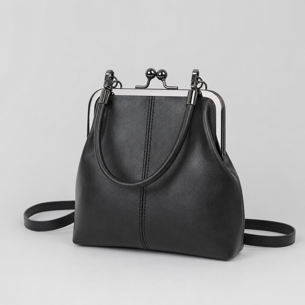 Stilvolle Damen Schultertasche im Vintage-Look, mit charakteristischem Kussverschluss, aus hochwertigem Kunstleder.