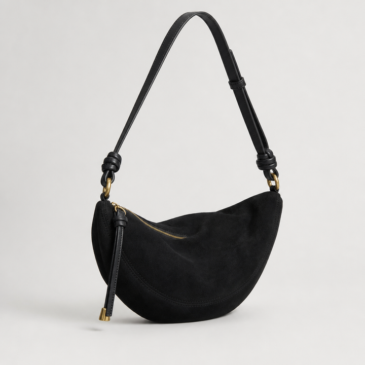 Schwarze Sling-Tasche für Damen in edler Wildleder-Optik, handliche und elegante Umhängetasche.