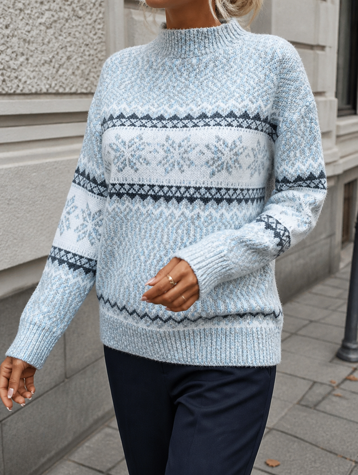 Winterlicher, eleganter Damen Pullover. Slimfit Langarm Pullover mit feinem Schneeflocken-Print und Halbstehkragen.