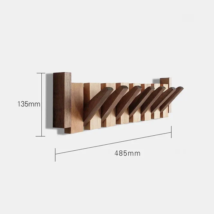 Stilvolle Garderobe in Klavieroptik mit robusten Wandhaken. Perfekt für den Flur & die Organisation von Kleidung.
