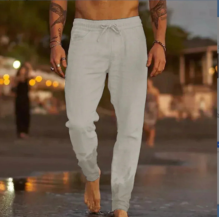 Atmungsaktive Herren Jogger Hose in Grau, mit Kordelzug für eine individuelle Passform, bequem für Freizeit.