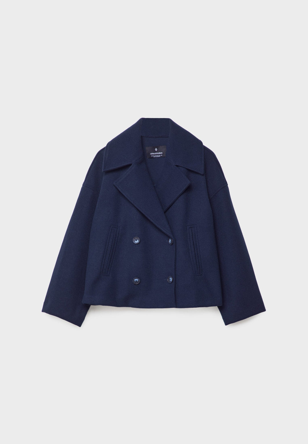 Kurzer Damen Zweireiher Mantel mit klassischem Revers. Stilvoller Herbst-Wintermantel für Damenmode.