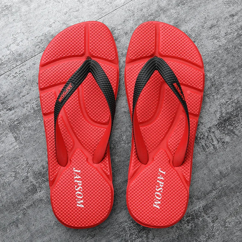 Nahaufnahme der texturierten Sohle von Herren Massage-Flip-Flops für therapeutische Fußstimulation.